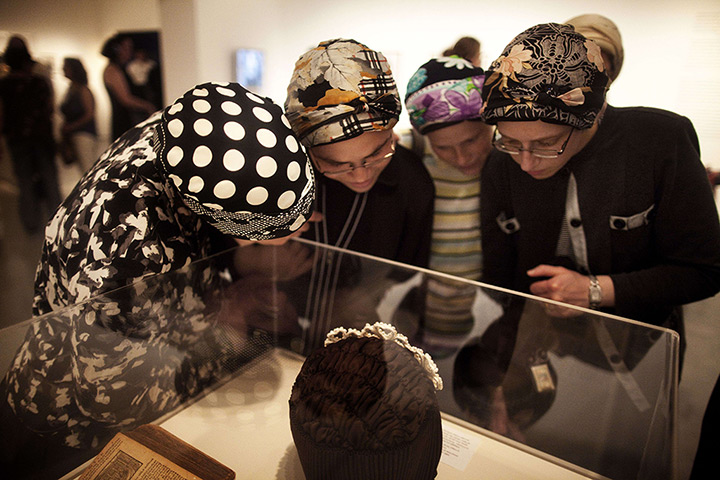 24 hours in pictures: Ultra-orthodox Jewish women visit  the Israel Museum exhibition