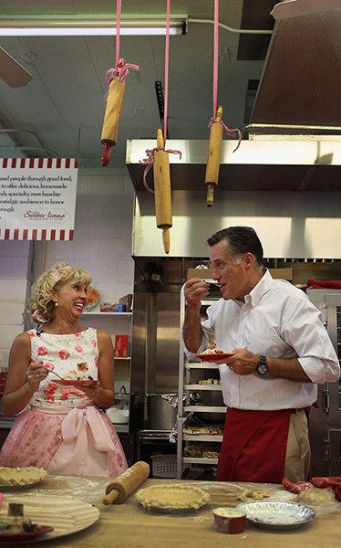 24 hours in pictures: Mitt Romney samples a cherry pie as Sweetie-licious Bakery, Michigan