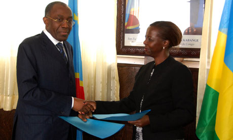 Congolese foreign minister Raymond Tshibandaf with Rwanda counterpart Louise Mushikiwabo June 2012