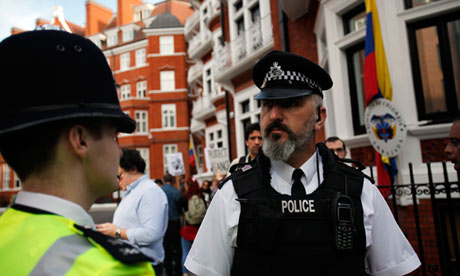 Police and protesters outside the Ecuadorean embassy in London, where Julian Assange has sought asylum. Photograph: Karel Prinsloo/EPA