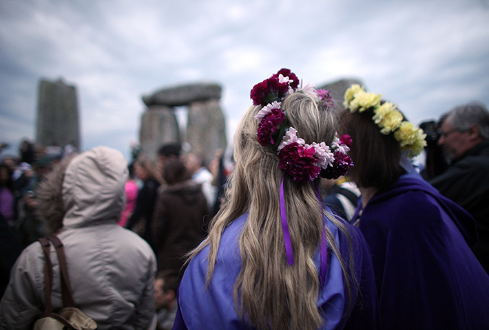 summer solstice: Revellers wearing garlands
