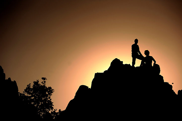 Picture desk live: People look at the dawn, Macedonia