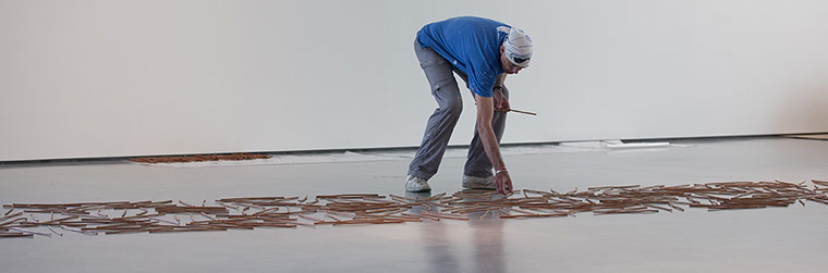 Richard Long : Richard Long laying out sticks at The Hepworth