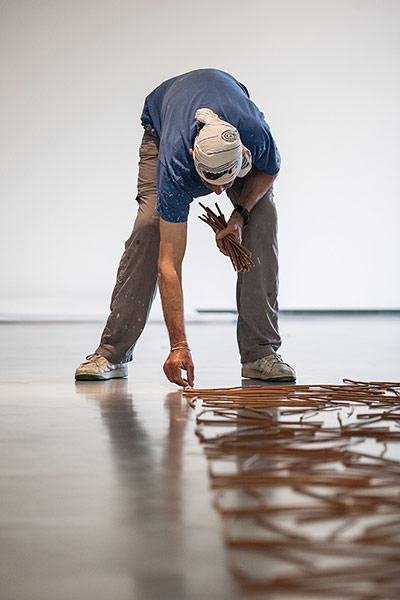 Richard Long : Richard Long laying out sticks at The Hepworth