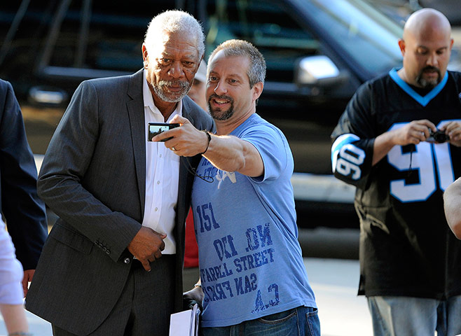week in film : A fan photographs himself with Morgan Freeman