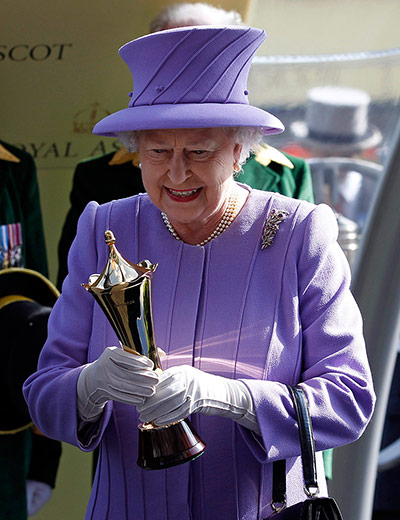 picture desk live update: The Queen holds trophy