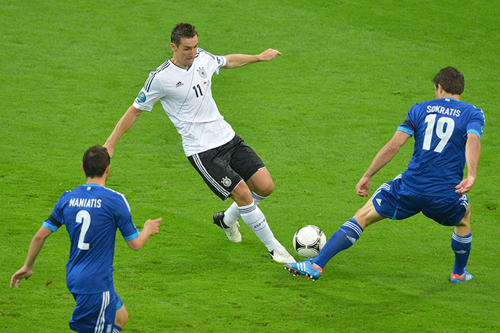 sport2: German forward Miroslav Klose vies with