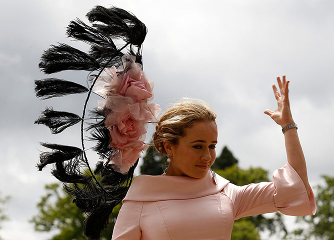24 hours: A racegoers' hat flies off in strong winds at Royal Ascot