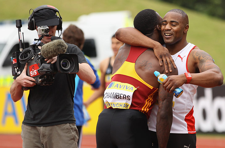 Athletics: Dwain Chambers is congratulated by Mark Lewis-Francis