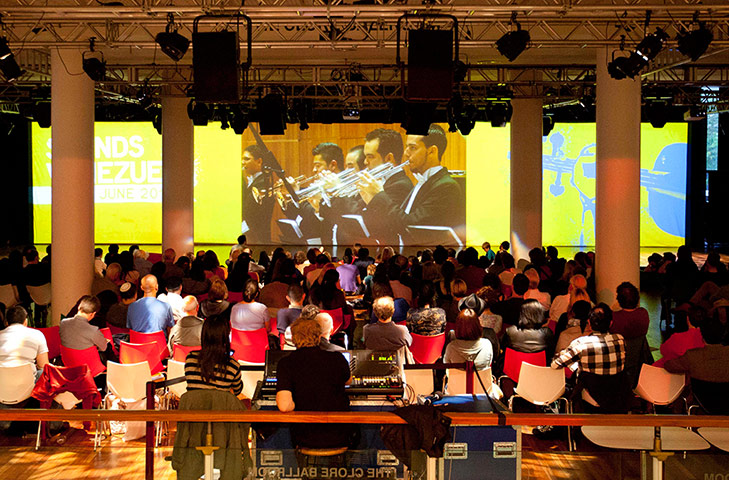 Southbank: People watch a live stream of the Simon Bolivar Symphony Orchestra