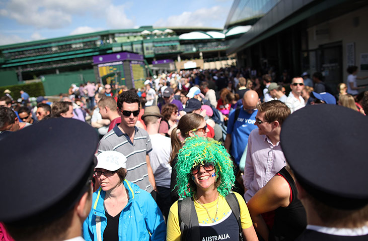 Picture desk live: Tournament stewards escort the fans