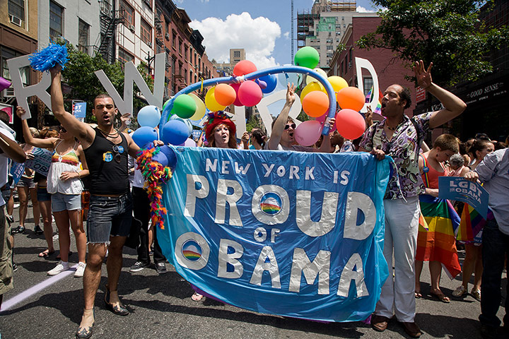 Gay pride week: New York, US: Marchers show their support for Obama
