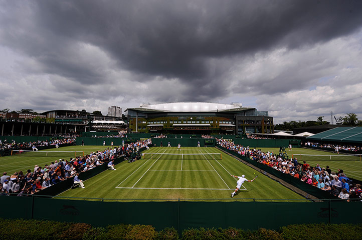 Wimbledon day 1: Play on court 10 under dark clouds