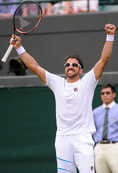 Wimbledon Day 1 part 3: Janko Tipsarevic celebrates his victory over David Nalbandian