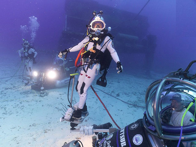Picture desk live update1: NASA underwater training