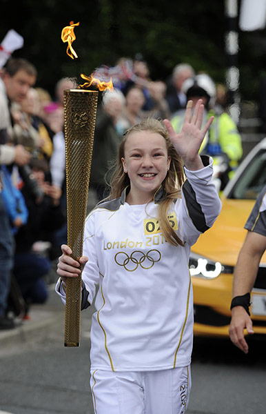 Olympic torch relay: Abigail Stone takes her turn in the relay through Morley