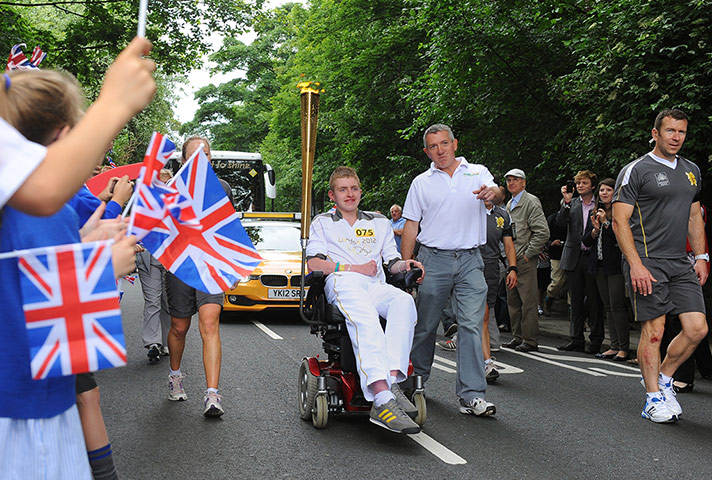 Olympic torch relay: Torchbearer Jack Mitchell carries the Olympic flame in Pontefract
