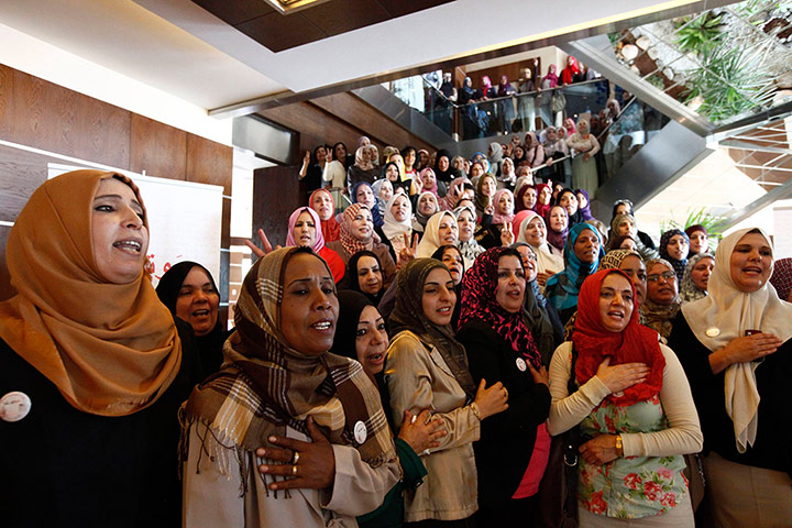 Picture desk live: Women candidates sing the national anthem at a conference in Tripoli