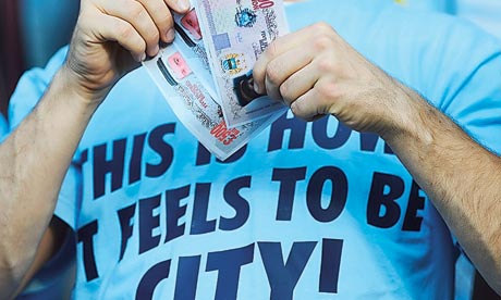 Manchester City fan with fake £500bn notes