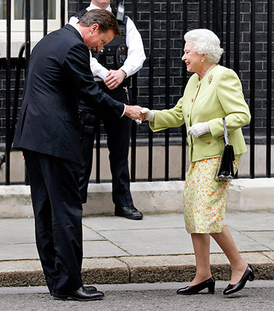Queen shaking hands: Queen meets David Cameron