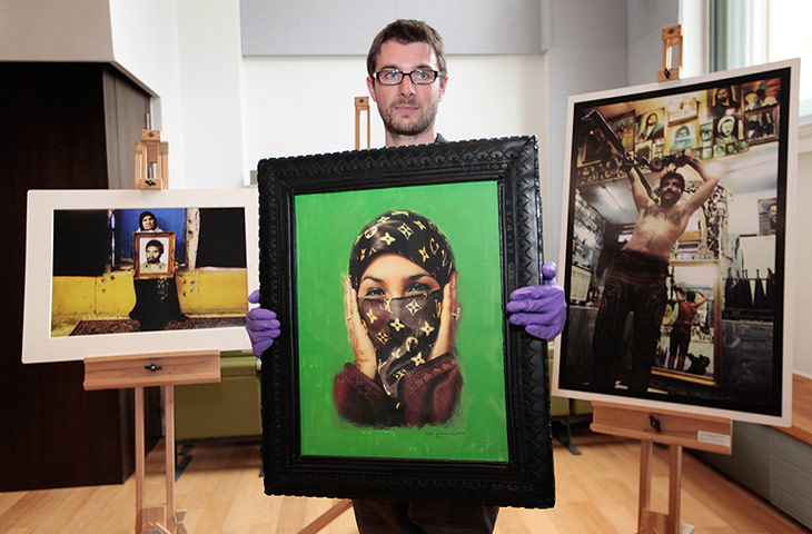 Picture desk live: The project manager prepares a photography exhibition at V&A Museum