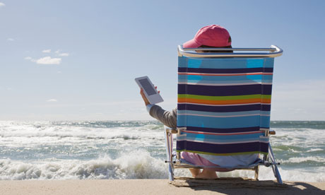 Reading ebook at the beach.