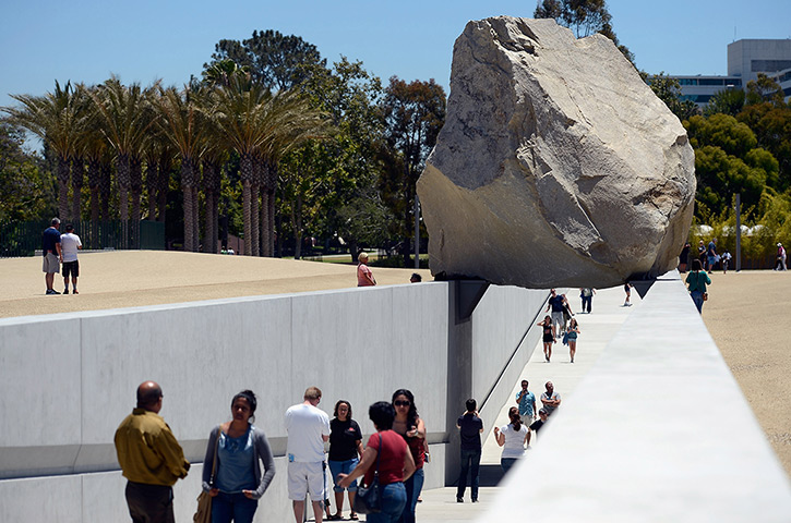 24 hours in pictures: Artist Michael Heizer's boulder, California