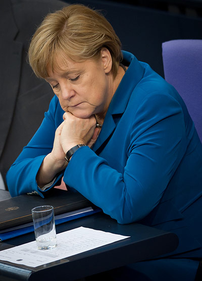 Picture desk live: Angela Merkel attends a session of the Bundestag in Berlin