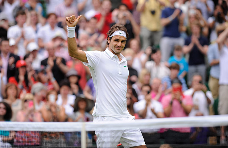 Day 3 Wimbledon: A happy Roger Federer celebrates at Wimbledon 2012