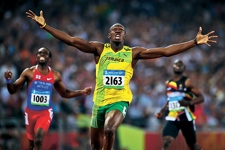 Tom Jenkins: Usain Bolt takes Olympic gold in a world record time in the men’s 200m