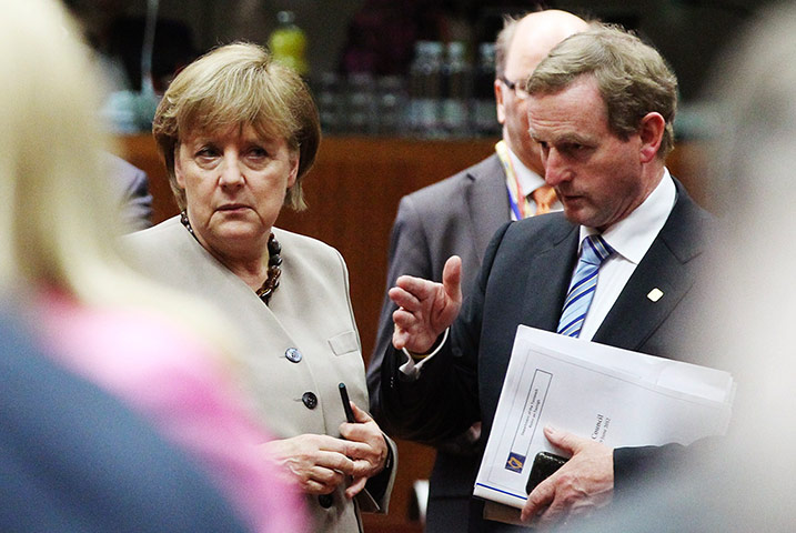 Picture Desk Live: German Chancellor Merkel listens to Ireland's PM Kenny