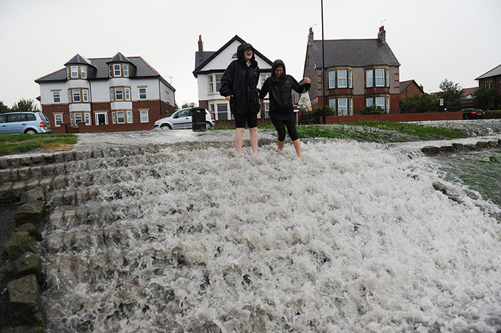 UK Flooding: Whitley Bay, North Tyneside: Water gushes down a set of steps