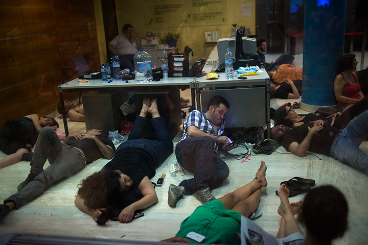 24 hours in pictures: NGO workers are seen occupying a government office 