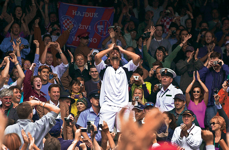 Tom Jenkins: Goran Ivanisevic after beating Pat Rafter in the final at Wimbledon, 2001