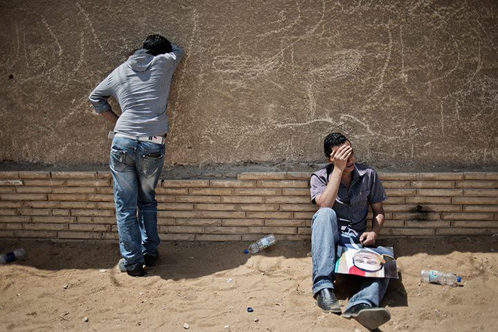 Mubarak trial: Pro-Mubarak demonstrators react after the verdict of Mubarak trial