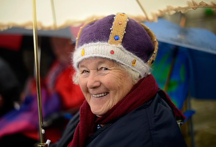 Jubilee pageant update: Spectator Janet Mead smiles as she waits for the start of the pageant
