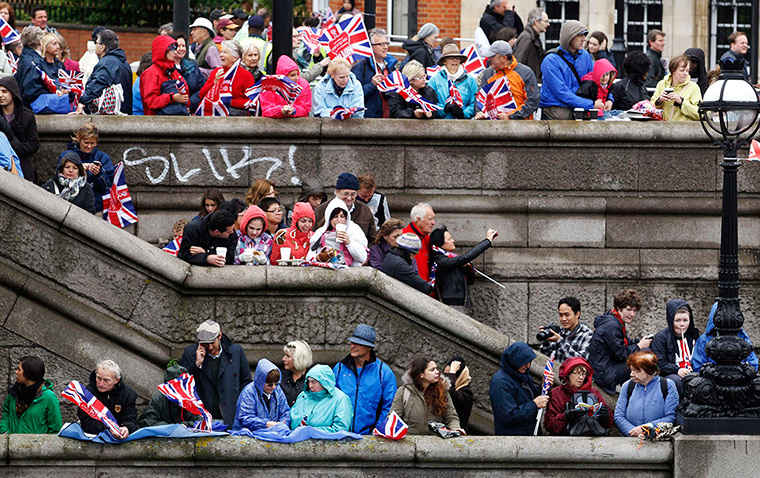 Jubilee pageant update: Spectators wait for the start of the pageant along the River Thames