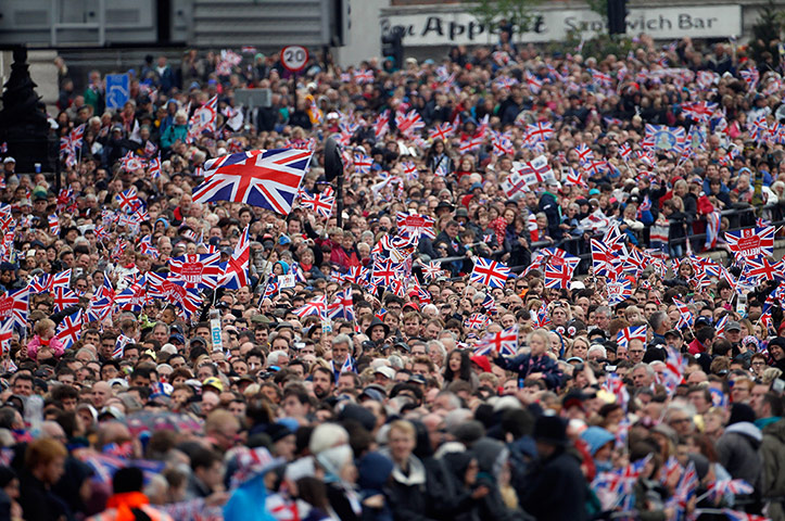 Regatta: Thousands of revellers line the embankment near Blackfriars Bridge 