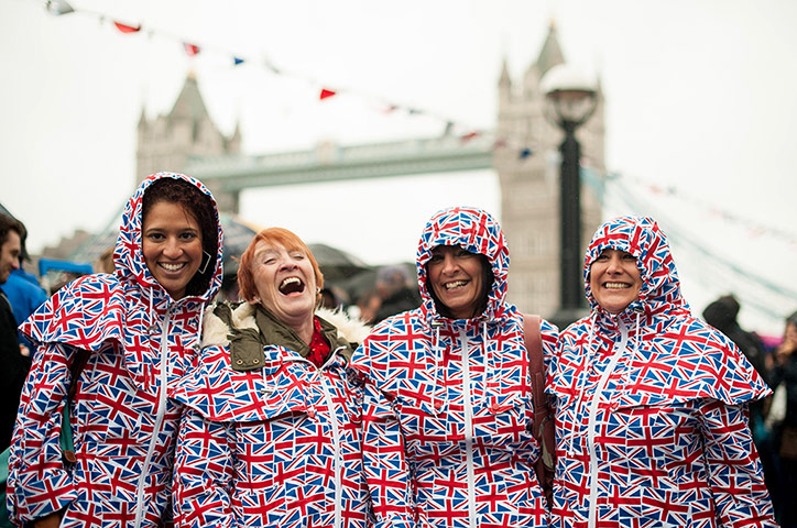Regatta: Spectators await the start of the river pageant near Tower Bridge