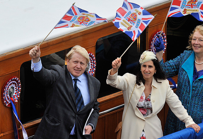 Jubilee Thames pageant: London Mayor Boris Johnson with his wife Marina wave flags