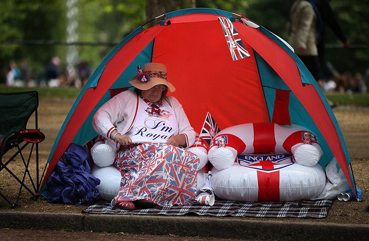 Diamond Jubilee day 2: A woman sits in a tent in The Mall 