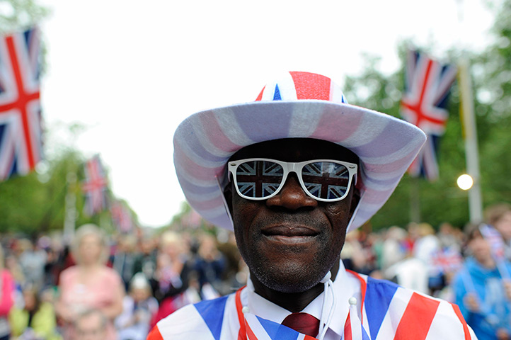 Diamond Jubilee day 2: A man wears a Union Flag outfit as he waits on The Mall 