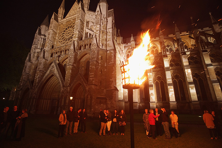 Jubilee beacons: Clergy and volunteers of Westminster Abbey and their guests watch a beacon 