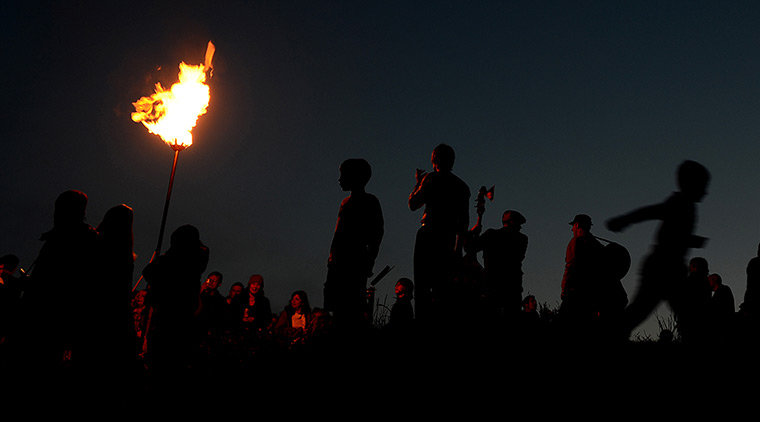 Jubilee beacons: A diamond jubilee beacon is lit at Mow Cop Castle near Kidsgrove 