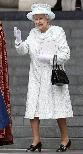 Jubilee fashion: The Queen waves as she leaves St Paul's Cathedral