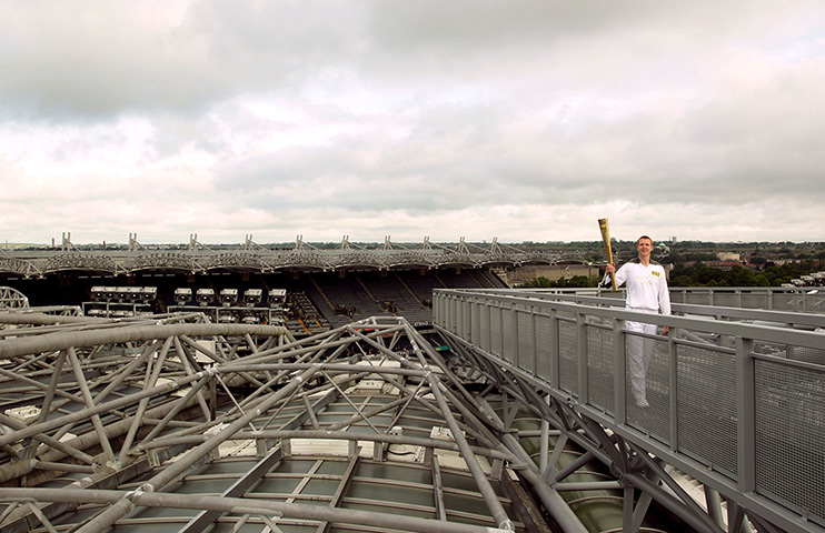 Torch relay day 19: Torchbearer 002 Henry Shefflin above Croke Park stadium 