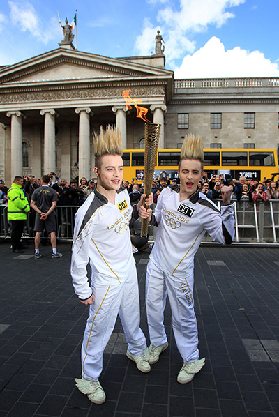 Torch relay day 19: Jedward carry the torch to the General Post Office in Dublin