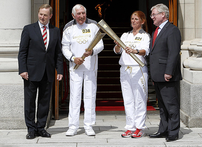 Torch relay day 19: Enda Kenny and Eamon Gilmore greet Ronnie Delaney and Bridget Taylor 