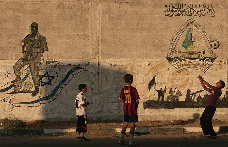 Gaza life: Palestinian boys play football 