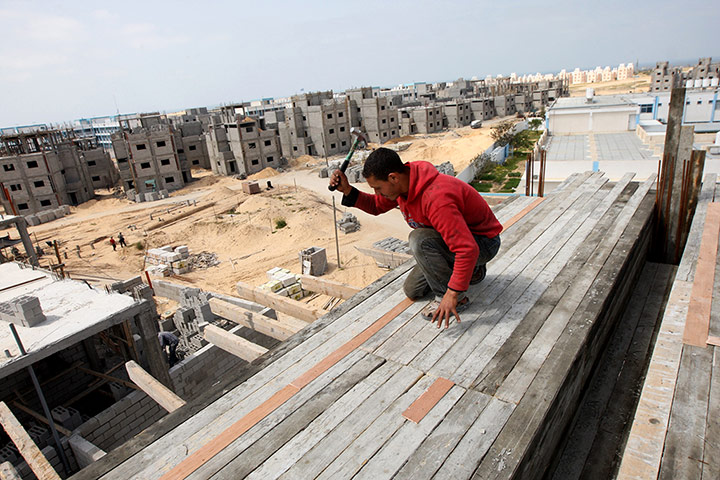 Gaza life: A labourer works at a construction site